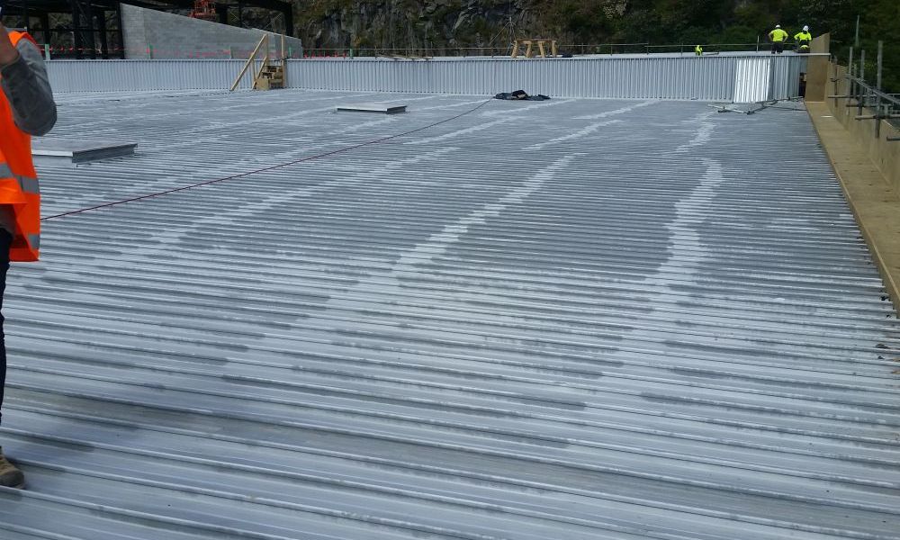Why recover an existing Metal Tray roof?