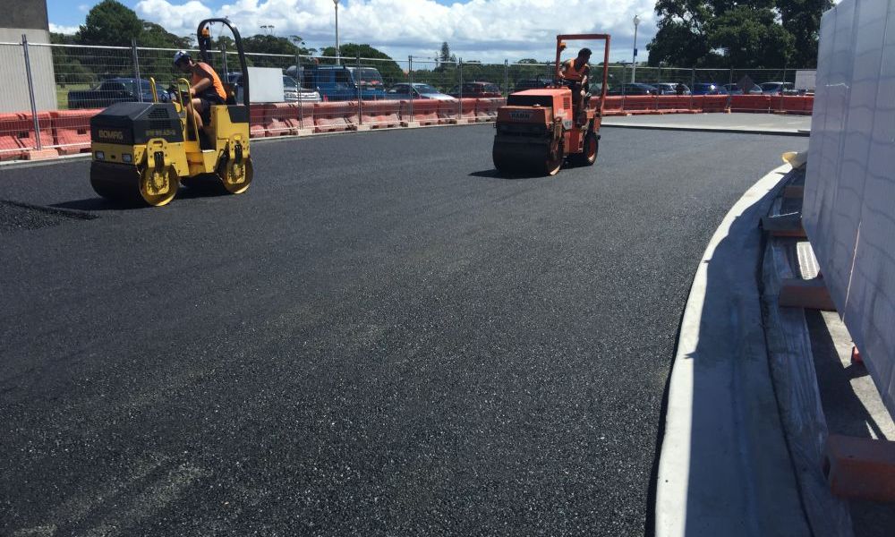 Asphalt being rolled on top of Nuraply 3PC